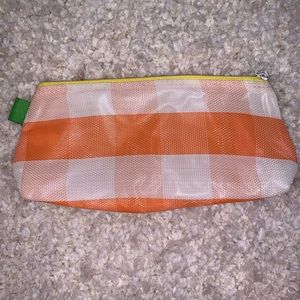 orange and white patterned bag